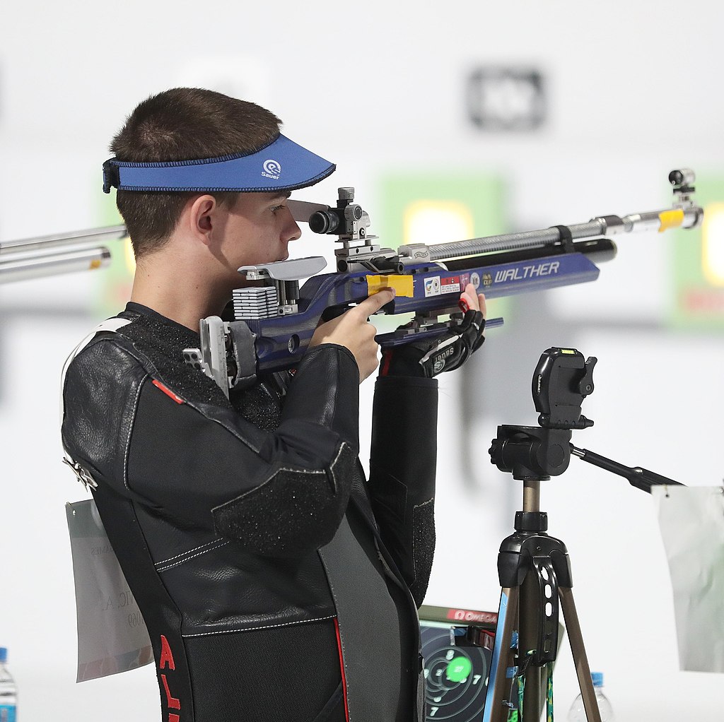 image of man shooting in the olympics