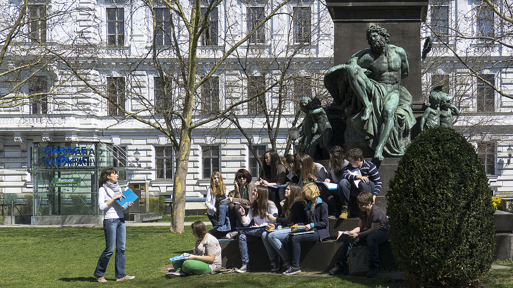 image of a women teaching a class outside