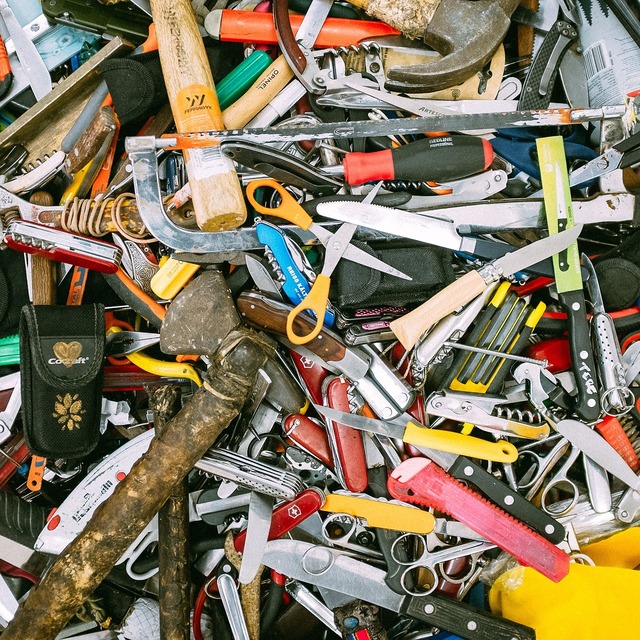 image of tools and weapons in a pile