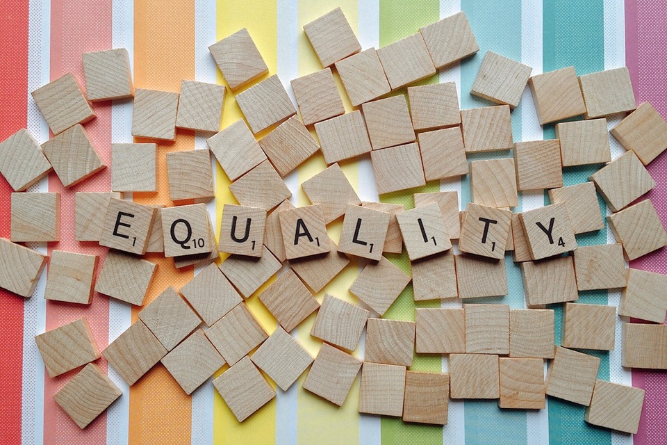 image of equality written in scrabble pieces