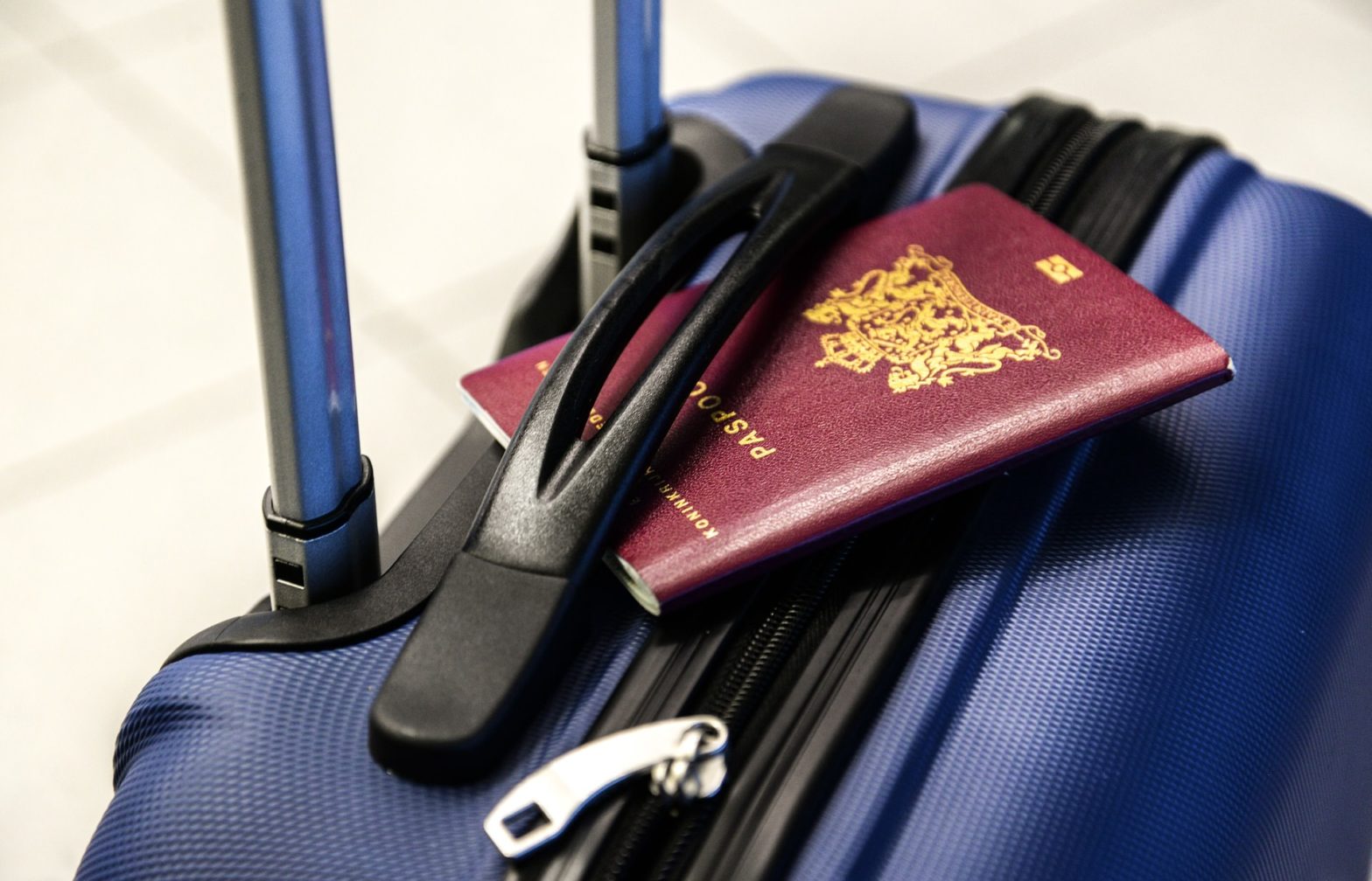 image of suitcase and passport
