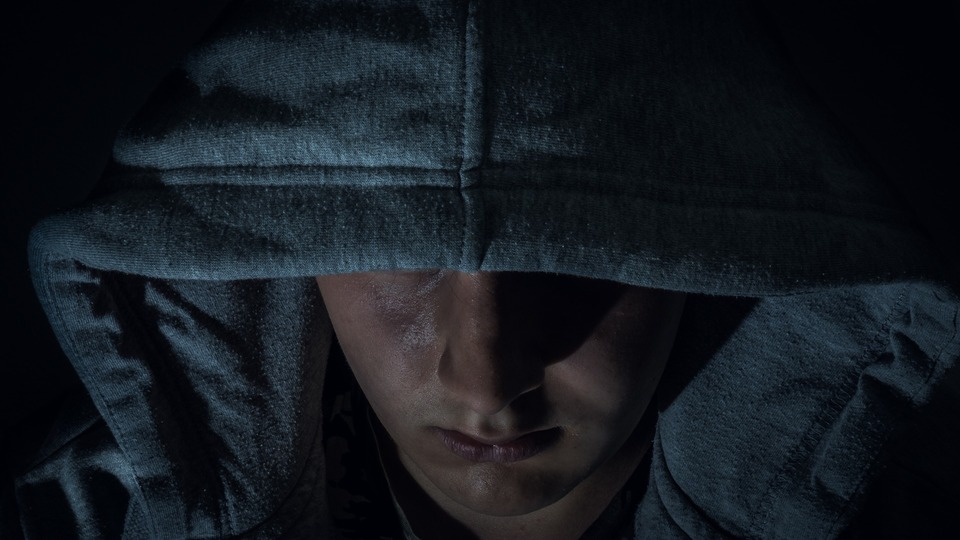 image of person with hoodie up