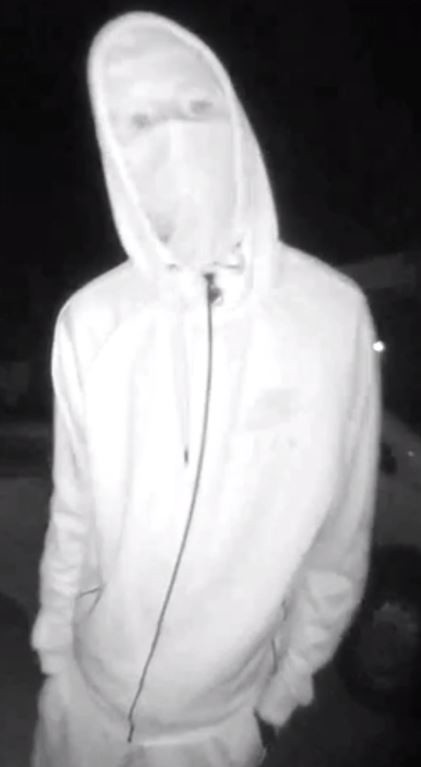 black and white image of man from cctv