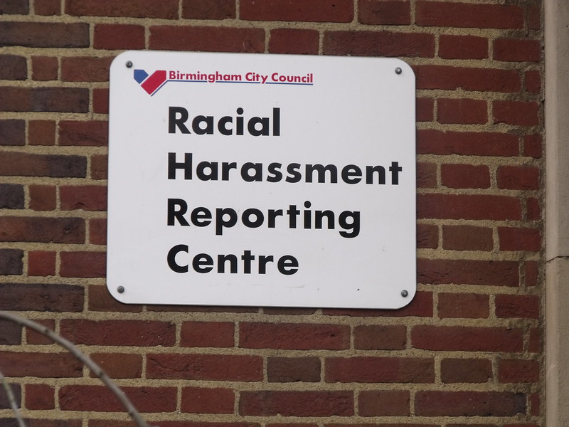 Racial harassment reporting centre outside sign
