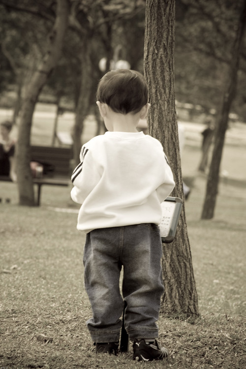 image of a young child walking away from the camera