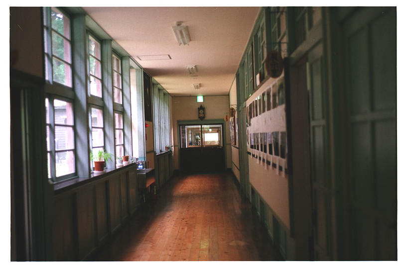 image of a long wooden corridor