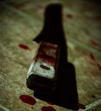 image of a knife with blood on it