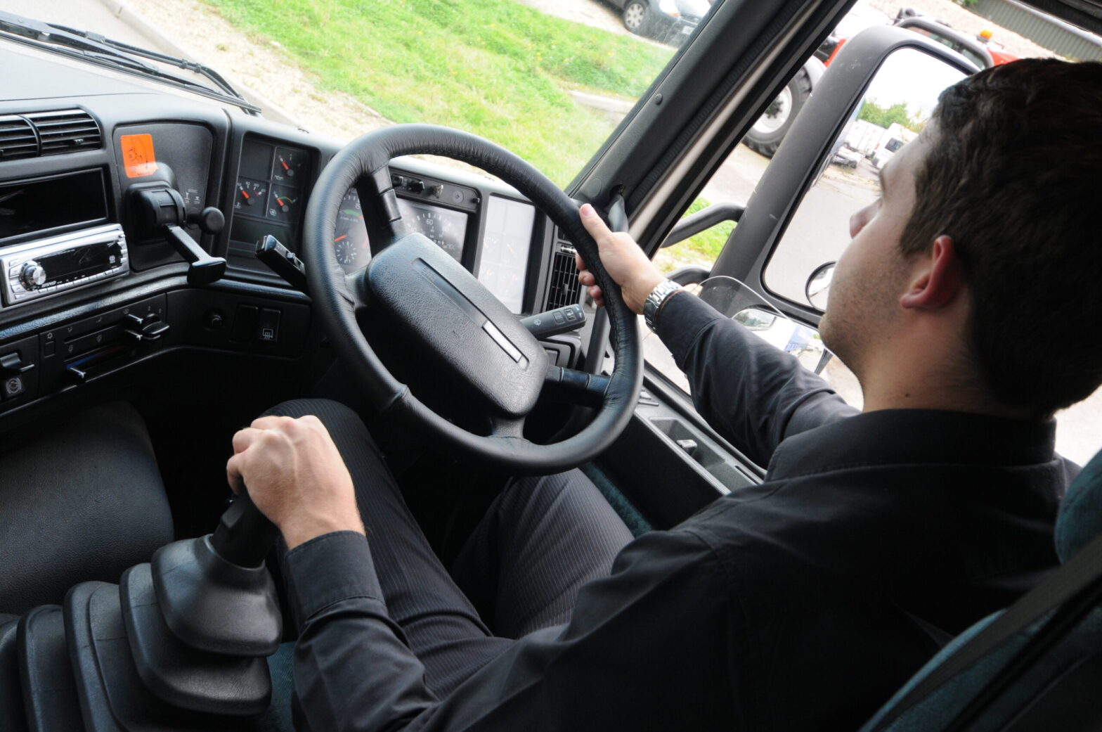 image of a man driving a lorry